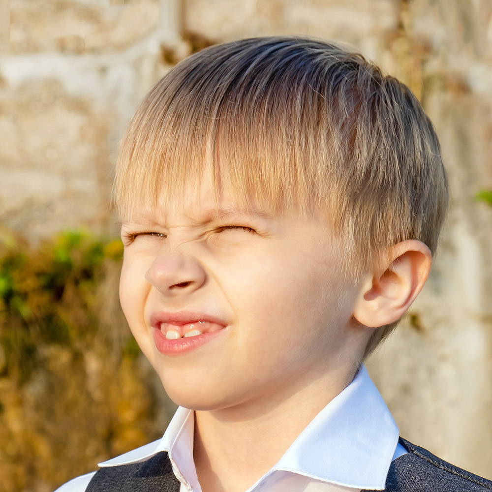 boy looking at the sun