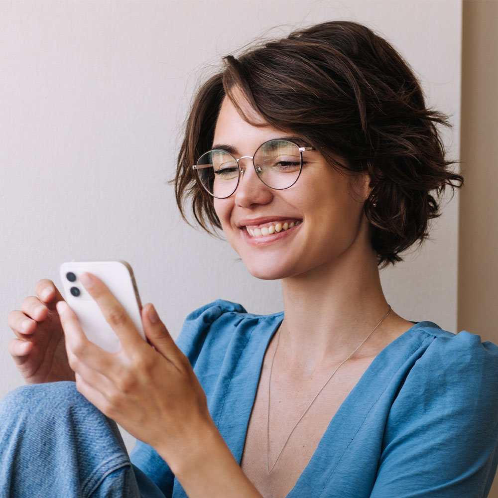 young woman wearing stylish designer glasses