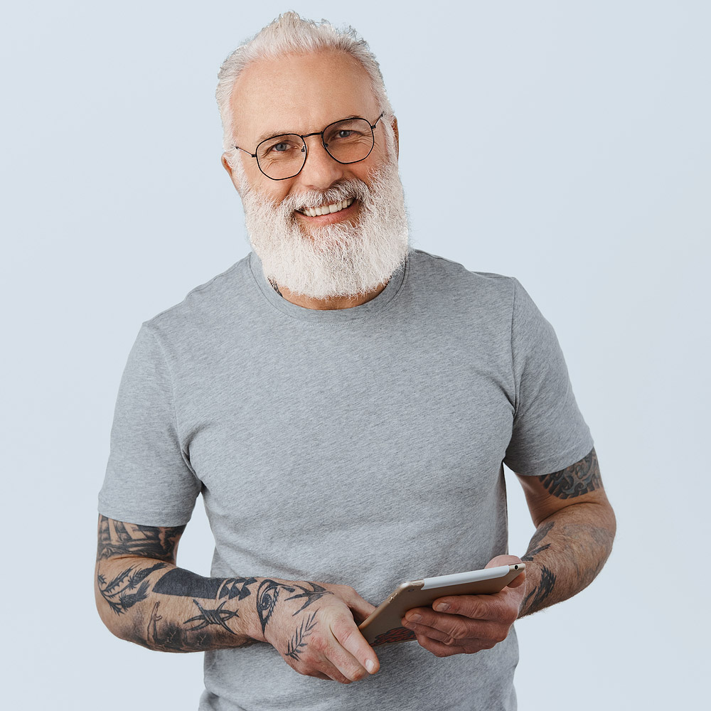 men with a white beard wearing glasses