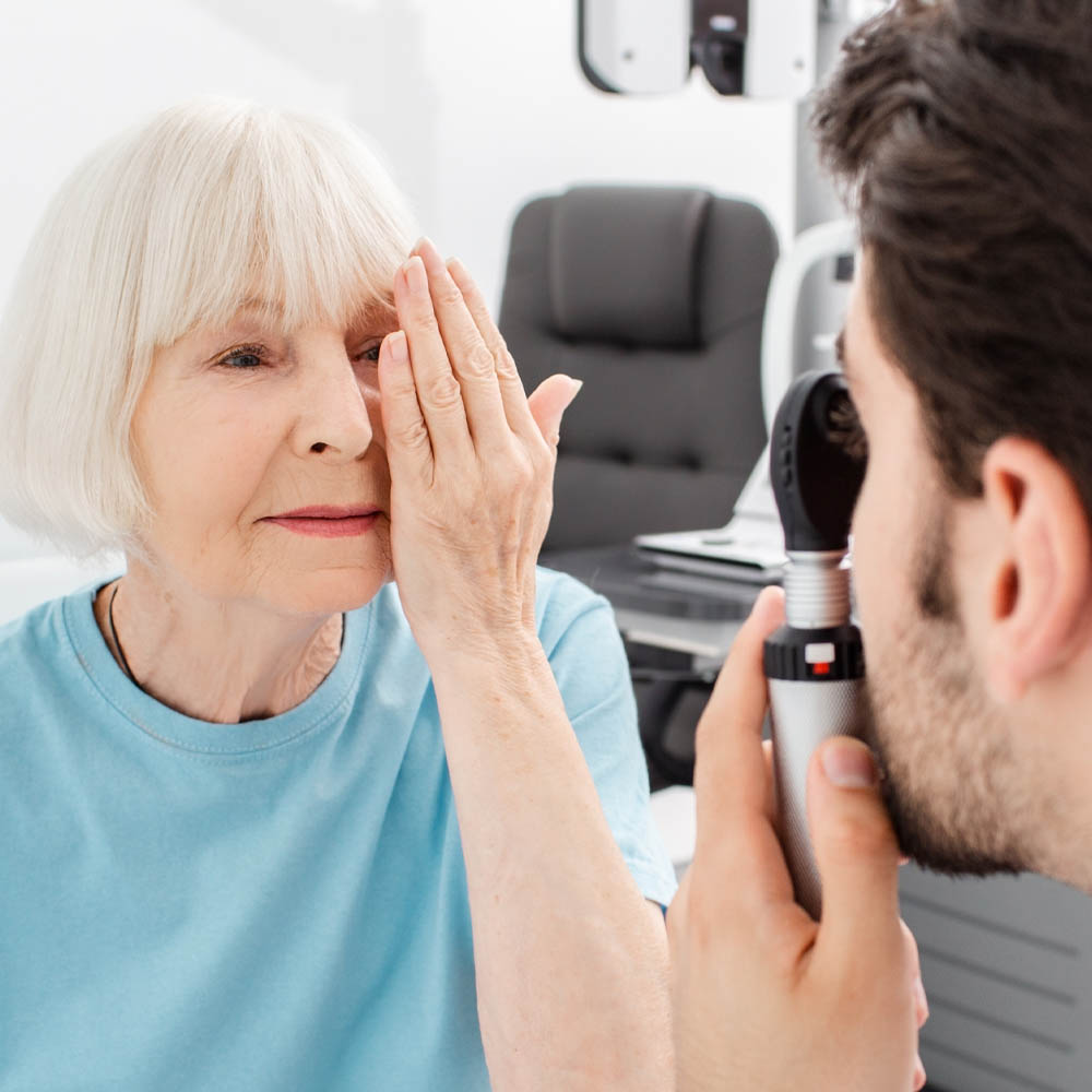 senior couple with AMD wearing glasses 