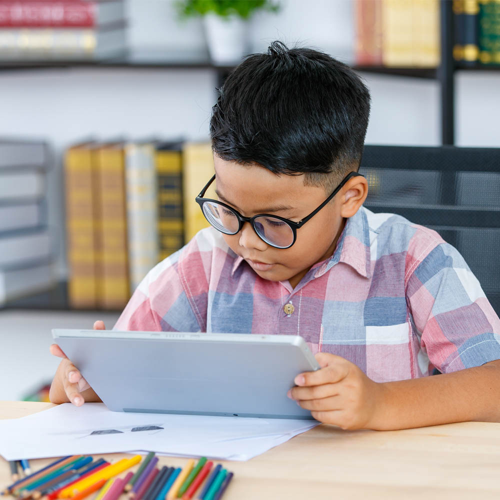 myopic child with a tablet